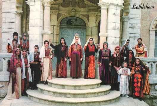 Postcard of a variety of Palestinian regional costume (pre 1948) from the collection of Maha Saca, Director, Palestinian Heritage Centre, Bethlehem